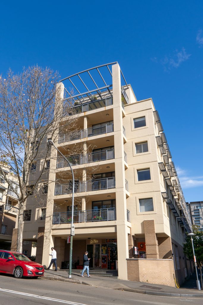 Modern Australian investment property at sunset representing smart lending solutions.