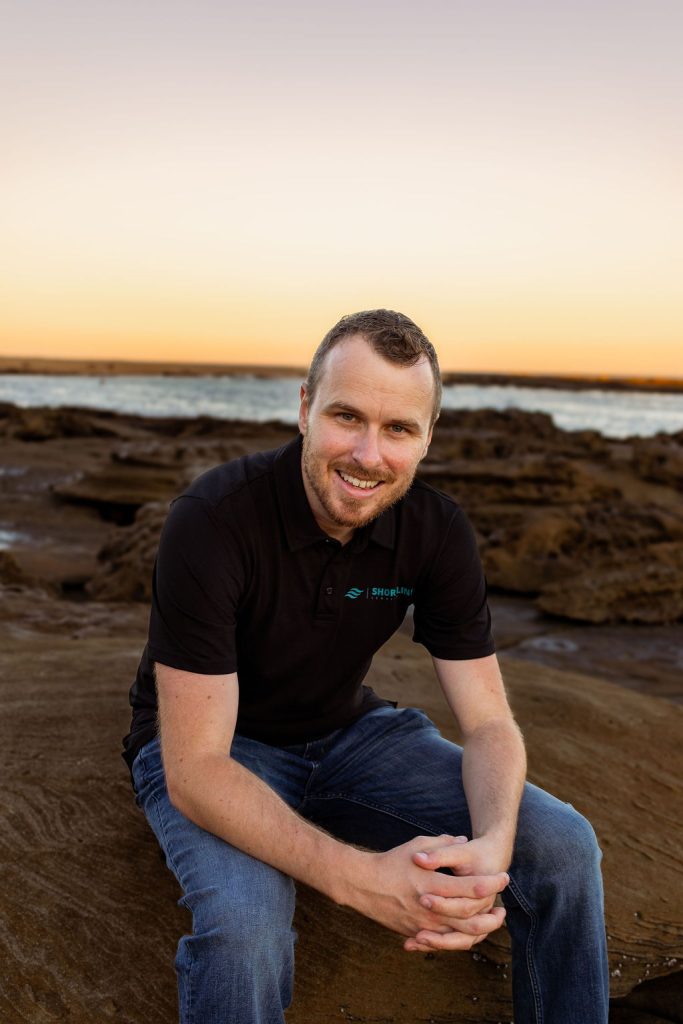 Justin Warwick, Director and Mortgage Broker at Shoreline Lending, pictured near the Central Coast coastline