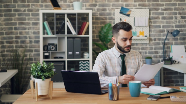 Mortgage broker reviewing Federal Budget 2026 property and lending changes on a laptop